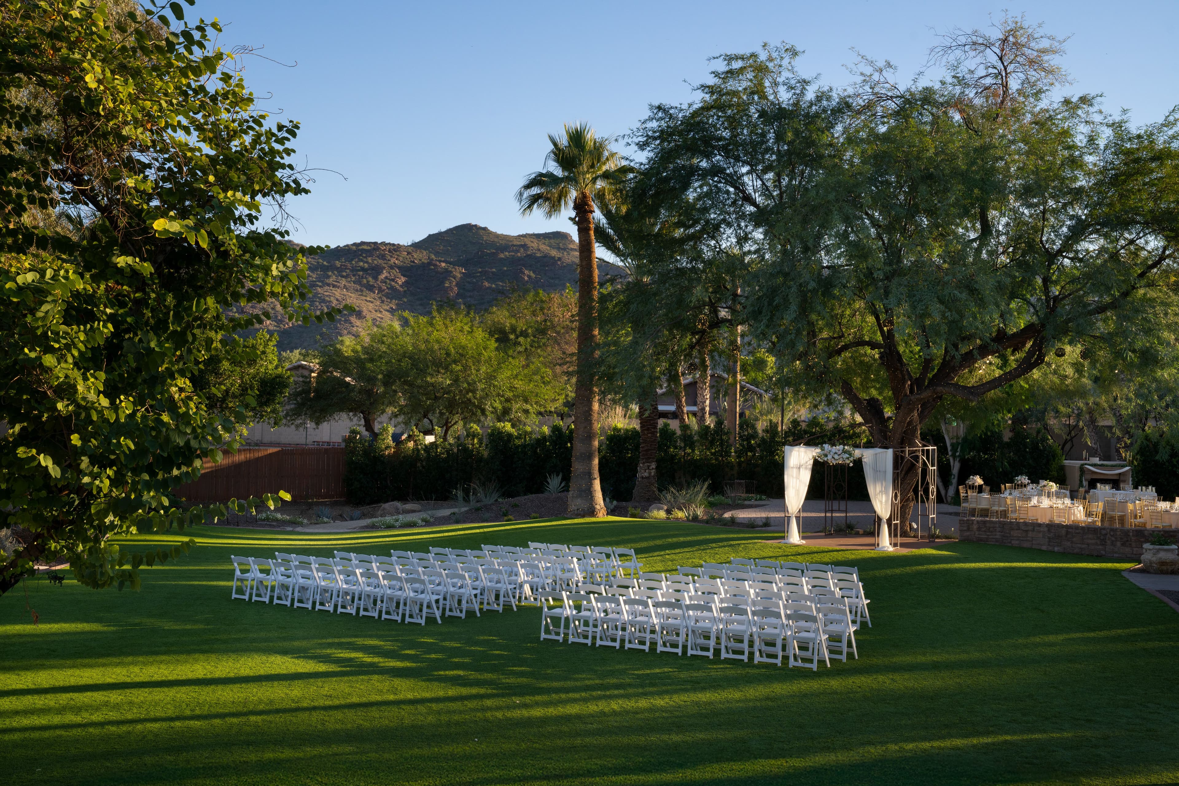 Newlywed couple sharing a quiet moment on the Spanish-style staircase at Secret Garden by Wedgewood Weddings.