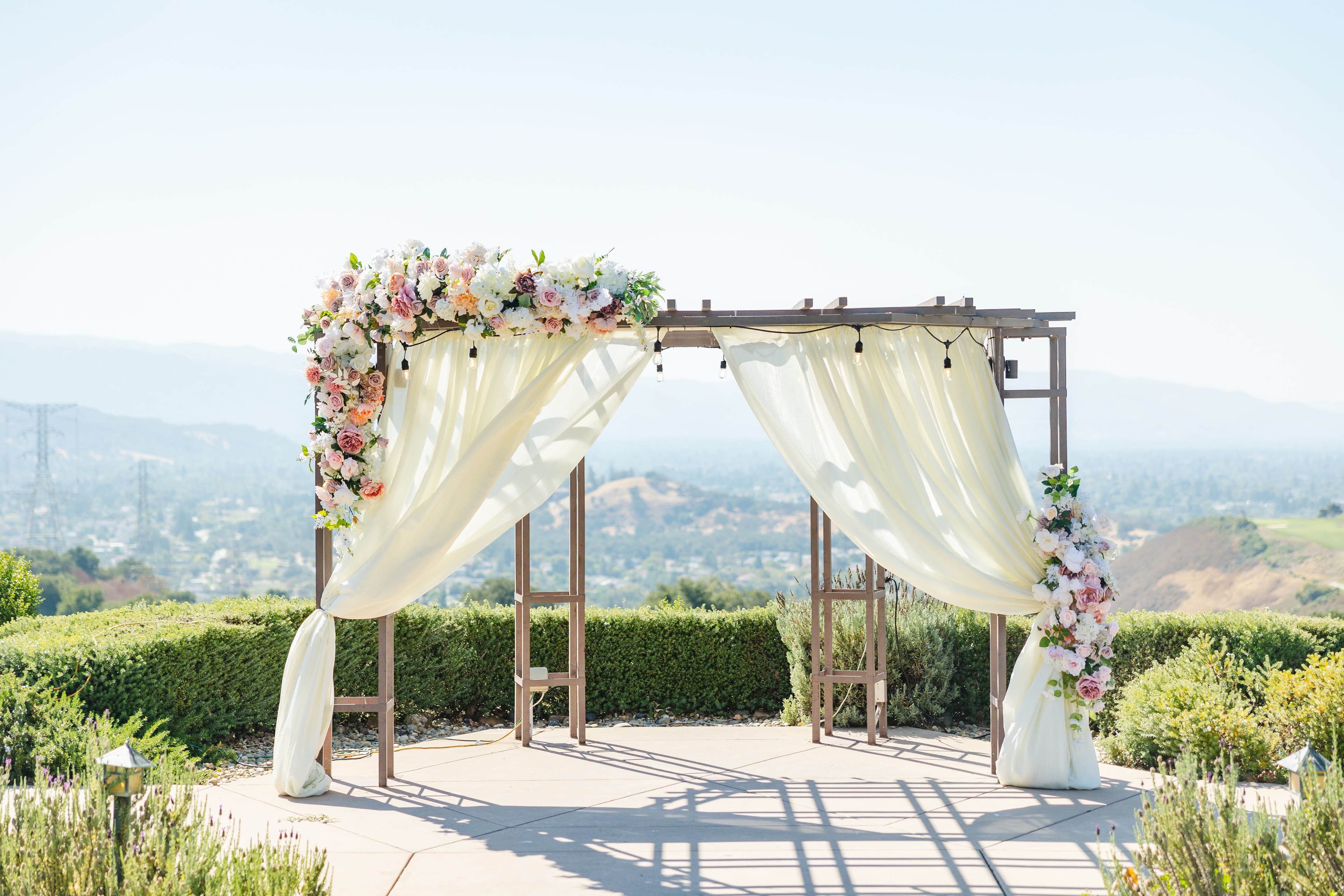 Boulder Ridge by Wedgewood Weddings Ceremony Arch Champagne Decor